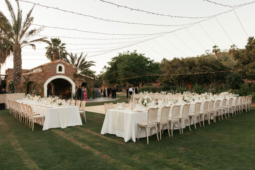 reception area and dinner seating in the mango grove at Flora Farms